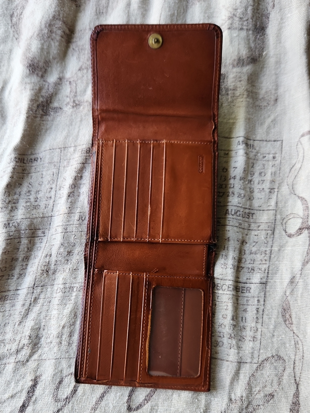 Coach Kisslock Tri-fold Wallet - Picture 8 of 11